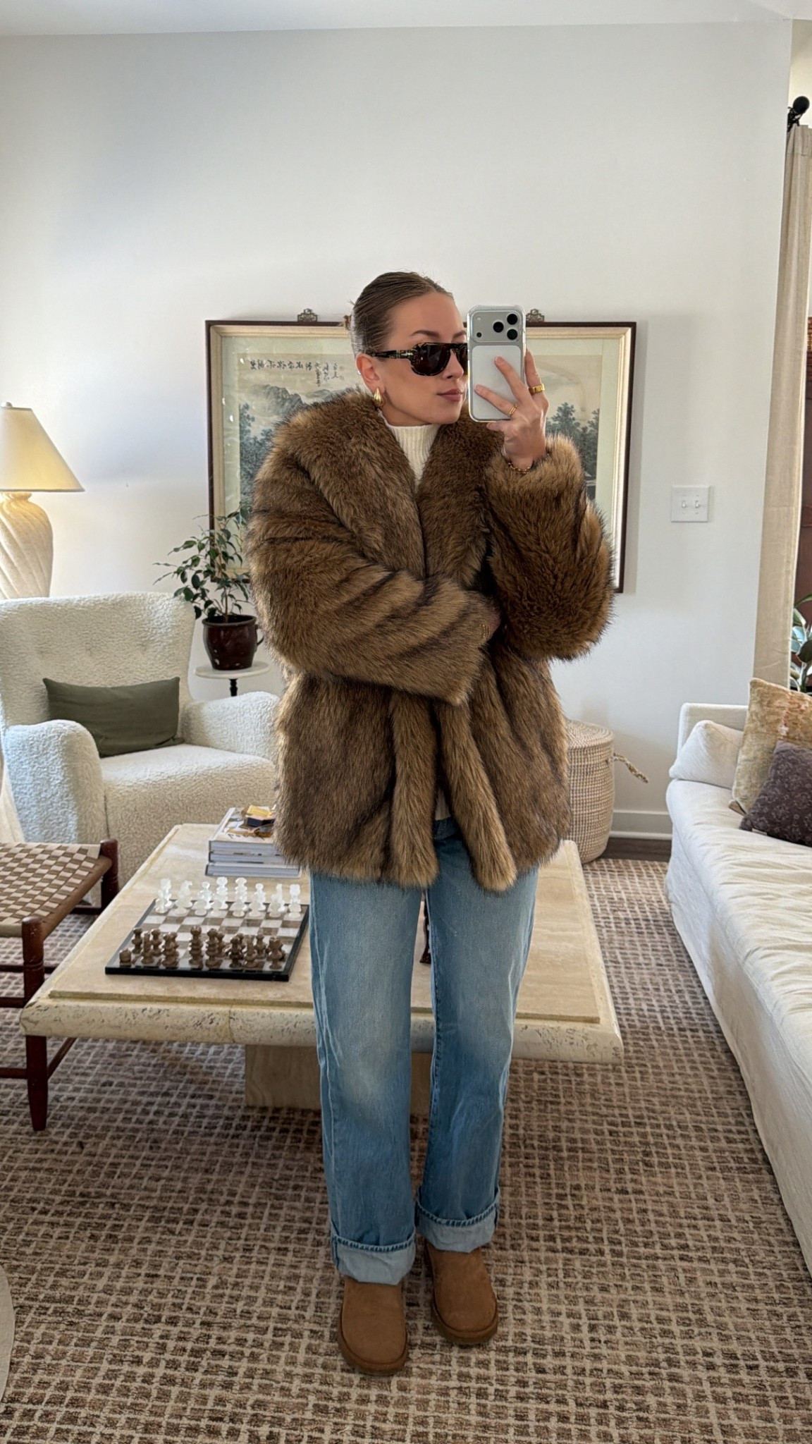 12/16/25 my cozy winter casual outfit, wearing my UGG mini boots and my Mother cuffed-hem jeans. My Abercrombie faux fur coat and turtleneck sweater are both a couple of years old, so I’m linking very similar options to recreate the same look. I’m also linking my Amazon earrings and my sunglasses to complete the outfit.

#LTKHoliday #LTKootd