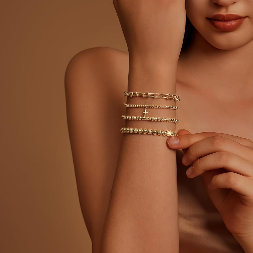 IMBOS Gold Bracelets for Women 14K Gold Plated Cross Bracelet Strand Bead Ball Bracelets stack Se... | Amazon (US)
