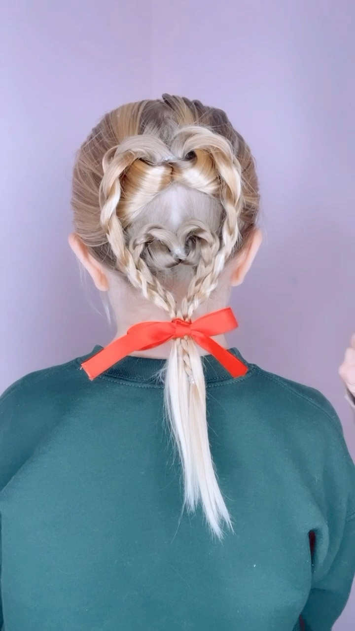 DOUBLE HEART HAIRSTYLE FOR THE HOLIDAY 🩷 I love how simple this hairstyle is! This is such a pretty one to do for the holiday season. I’m sharing my favorite hair products with you and our favorite ribbon for hairstyles.

#LTKHoliday