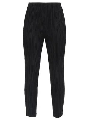 High-rise technical-pleated tapered trousers | Pleats Please Issey Miyake | MATCHESFASHION | Matches (US)