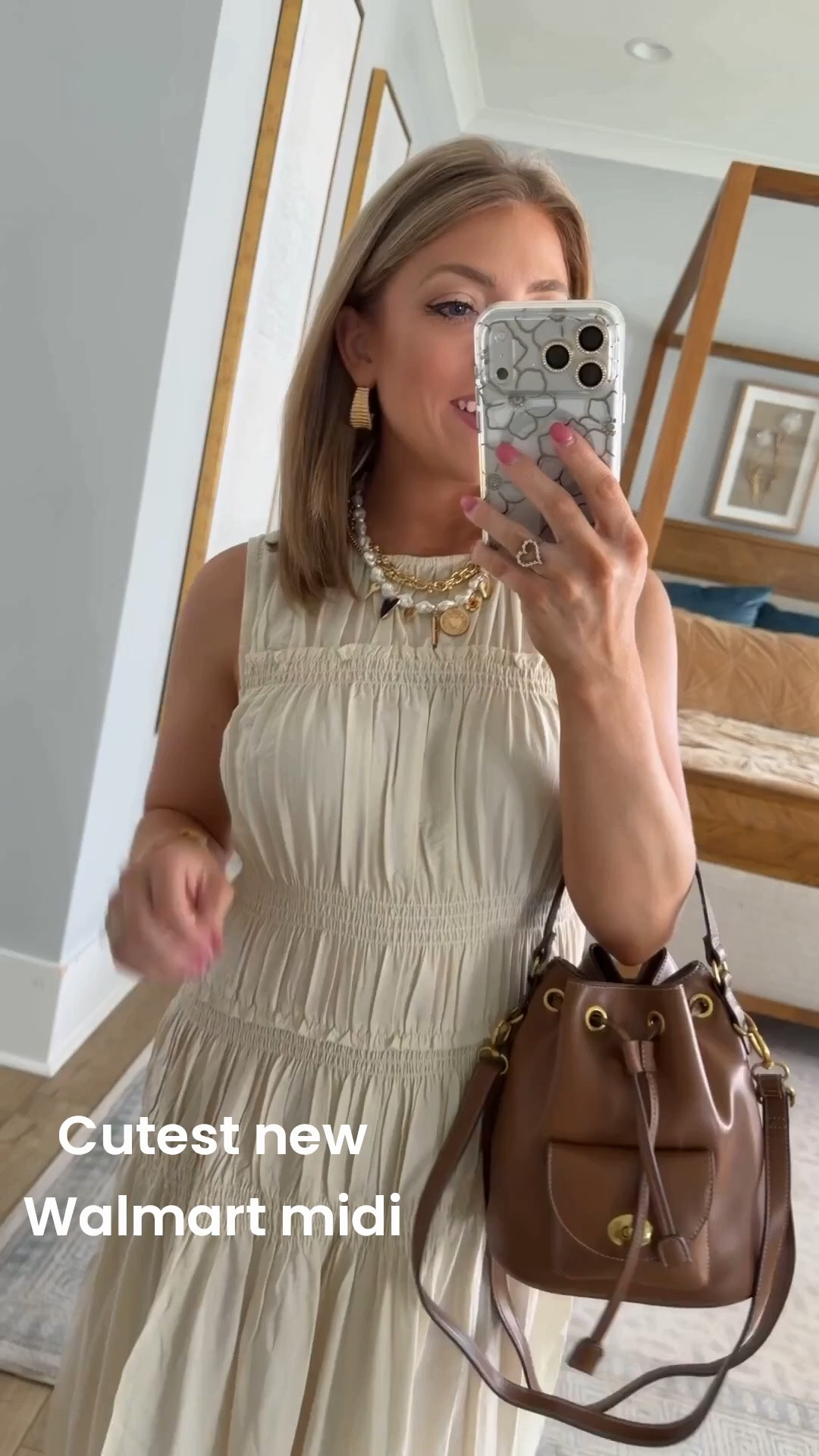 This Walmart dress looks so much more expensive than it is! 🤍✨

If you’re looking for an easy dress you can wear now and transition into fall, this new Walmart find is such a good one. I love the flattering smocked bodice, flowy midi length, and classic neutral color that goes with everything. I paired it with leopard Mary Jane flats and a brown bucket bag for an elevated everyday look that feels timeless.

Perfect for brunch, church, baby showers, family photos, or just those days when you want to feel put together with minimal effort!

#WalmartFashion #WalmartFinds #WalmartStyle #WalmartNewArrivals #MidiDress #NeutralStyle #AffordableFashion #BudgetStyle #EverydayOutfit #FallTransitionStyle #ClassicStyle #MomStyle #FashionFinds #OOTD #StyleInspiration #AffordableStyle #LeopardFlats #HandbagStyle #CasualChic #WomenWhoShop

#LTKootd #LTKPetite #LTKTravel