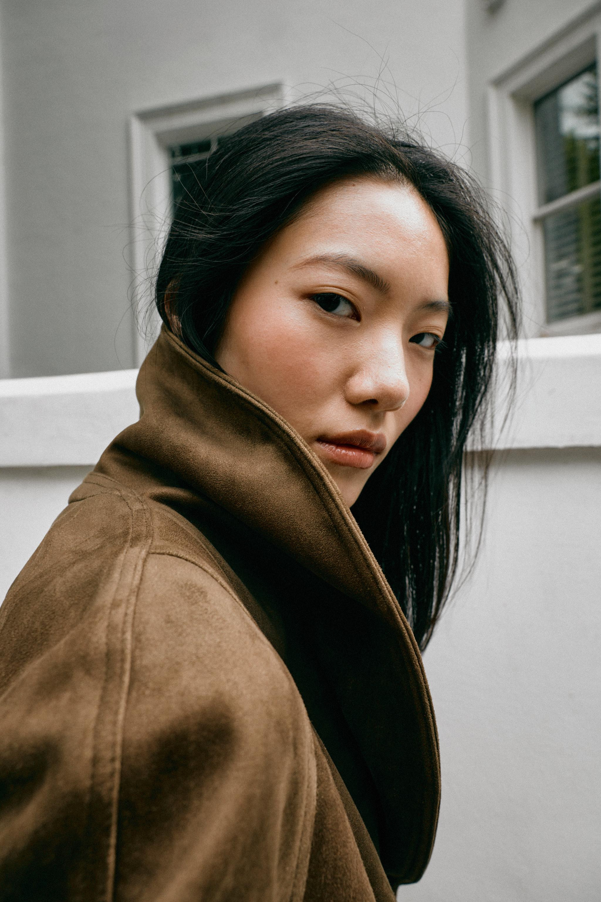 Faux suede jacket with a lapel collar and long sleeves. Front welt pockets. Matching fabric belt ... | Zara US