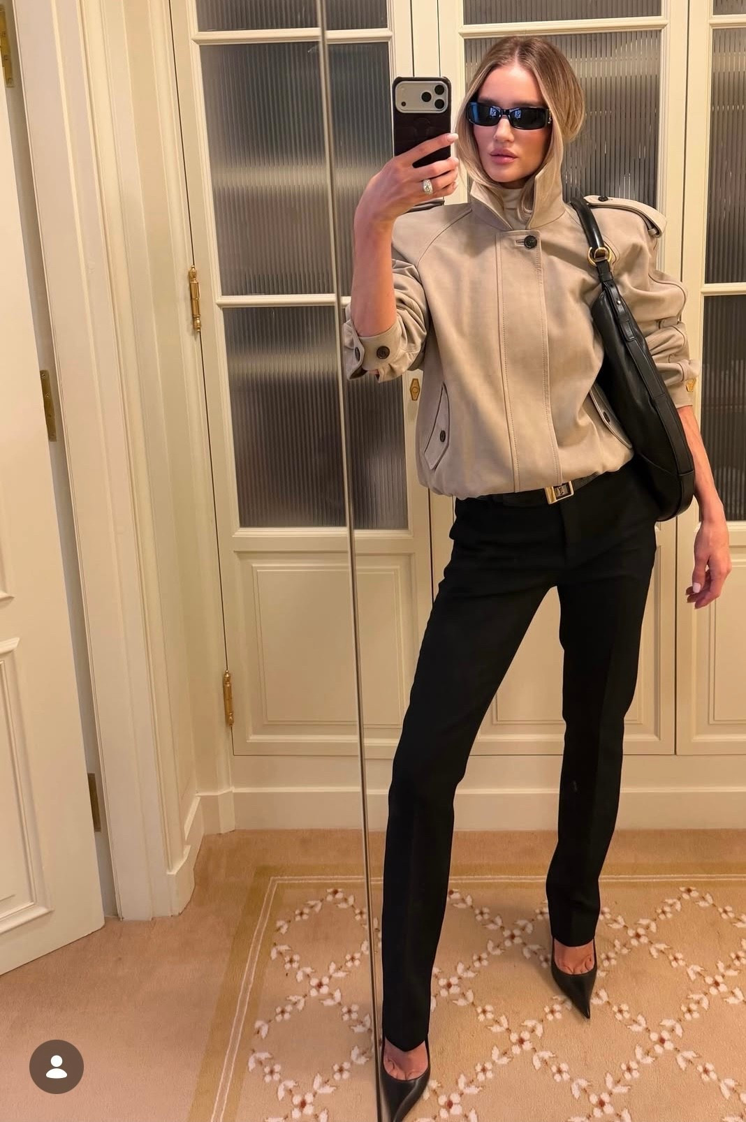 Rosie Huntington-Whiteley stepped out at The Row Fall Winter 2026 show in Paris wearing the kind of effortless look that defines quiet luxury.

A fitted black knit paired with a camel suede maxi skirt creates a clean A line silhouette that feels polished, timeless, and incredibly wearable. She finished the look with sheer tights, minimal heels, and sleek rectangular sunglasses for that signature Rosie Huntington-Whiteley minimal style.

I found suede skirt options, classic black knits, and similar sunglasses so you can recreate the look.

Everything is linked below.

#celebritystyle #celebritystyleexpert
