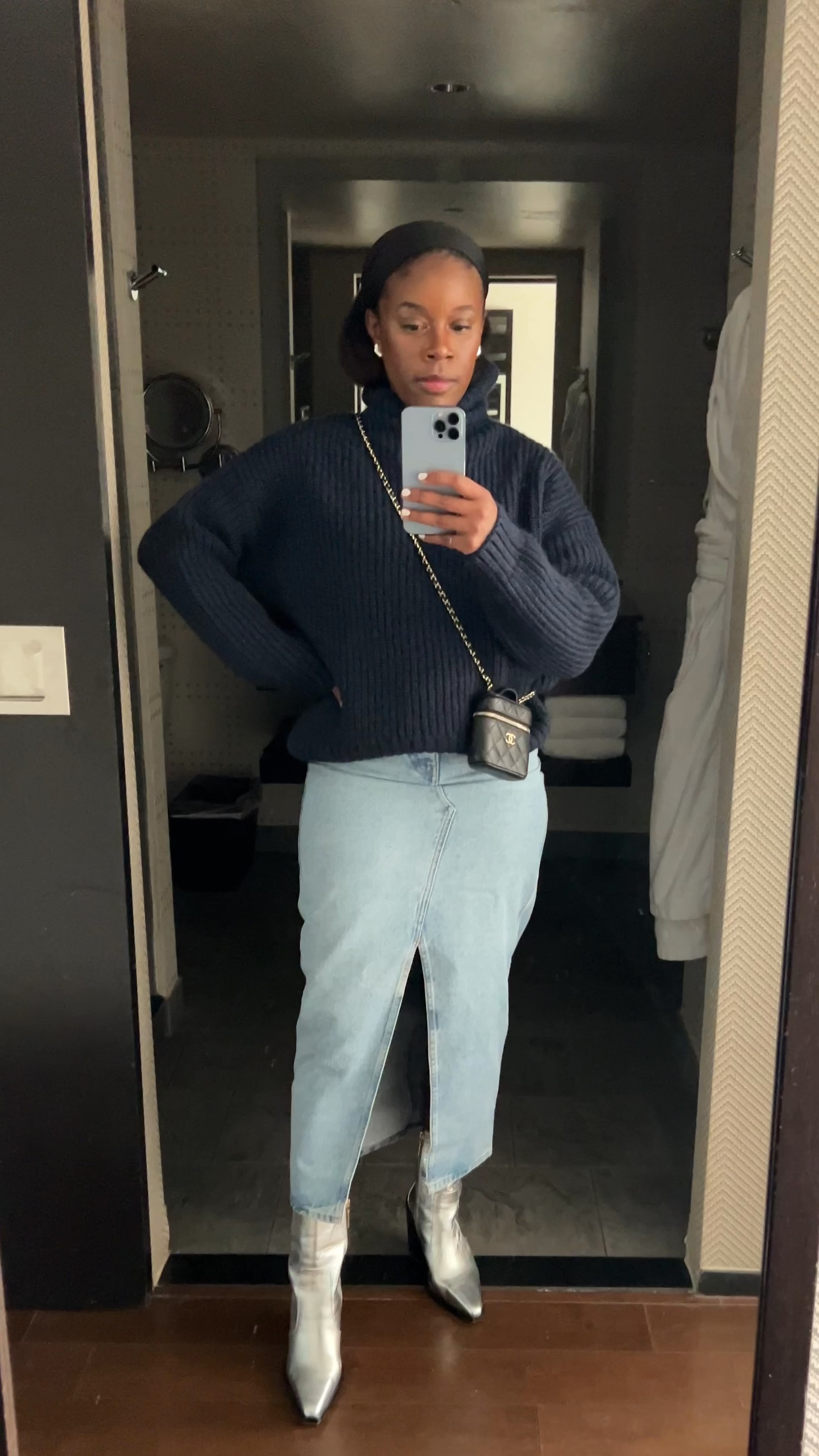 Casual easy simple outfit to wear for a night out to dinner chunky knit turtleneck sweater with denim midi skirt and cool silver metallic boots

#LTKSpringSale #LTKstyletip #LTKshoecrush