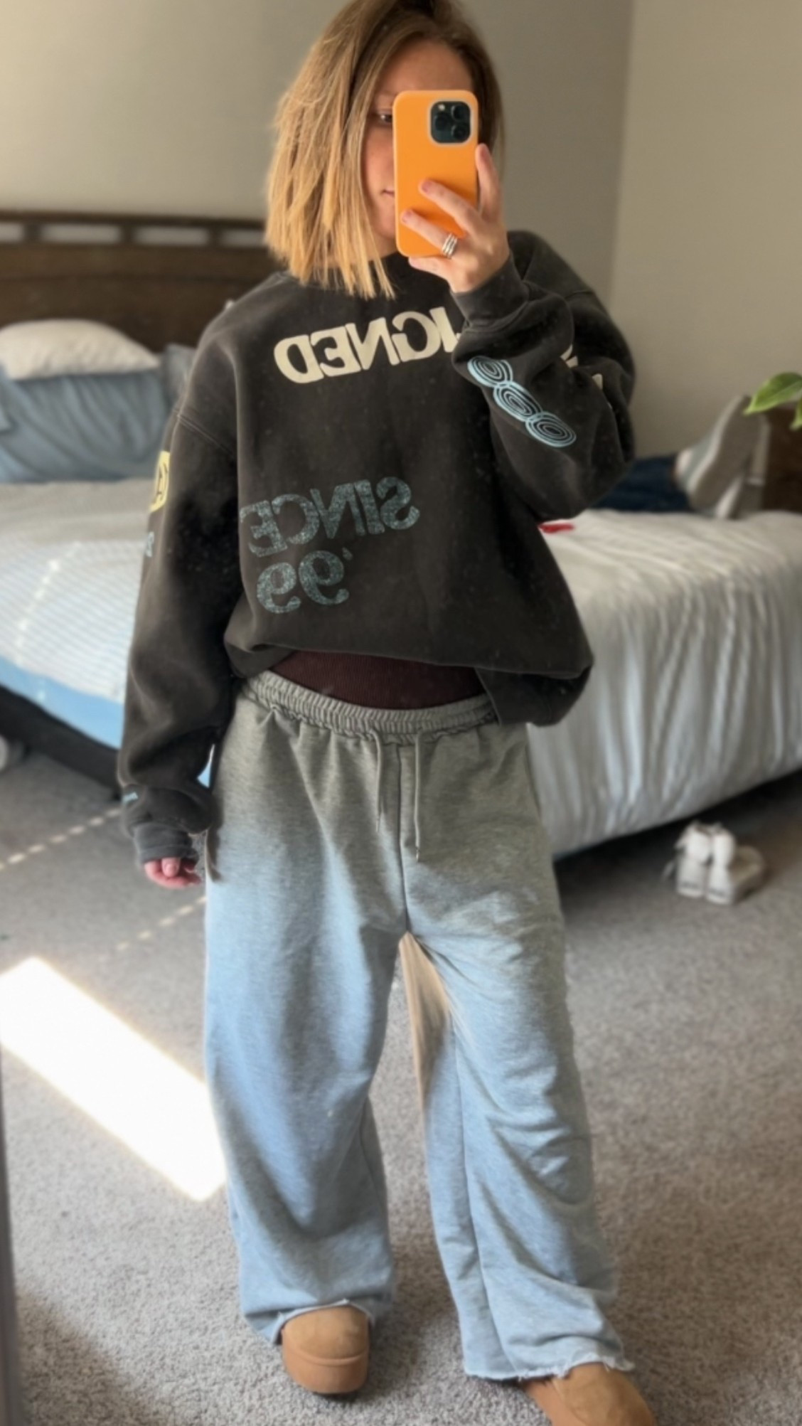 This is my go-to stay-at-home athleisure outfit when I want to be comfy but still feel put together. Cozy enough to feel like pajamas, but cute enough to wear all day.

Oversized graphic crewneck sweatshirt, soft biker shorts, relaxed sweatpants, and UGG slippers — aka my uniform for working from home, mom life, errands, or slow mornings.

Perfect if you love casual athleisure, cozy lounge outfits, or chill everyday wear that doesn’t try too hard. This is the kind of outfit you live in, not just wear once.

#LTKmomlife #LTKootd #LTKPetite