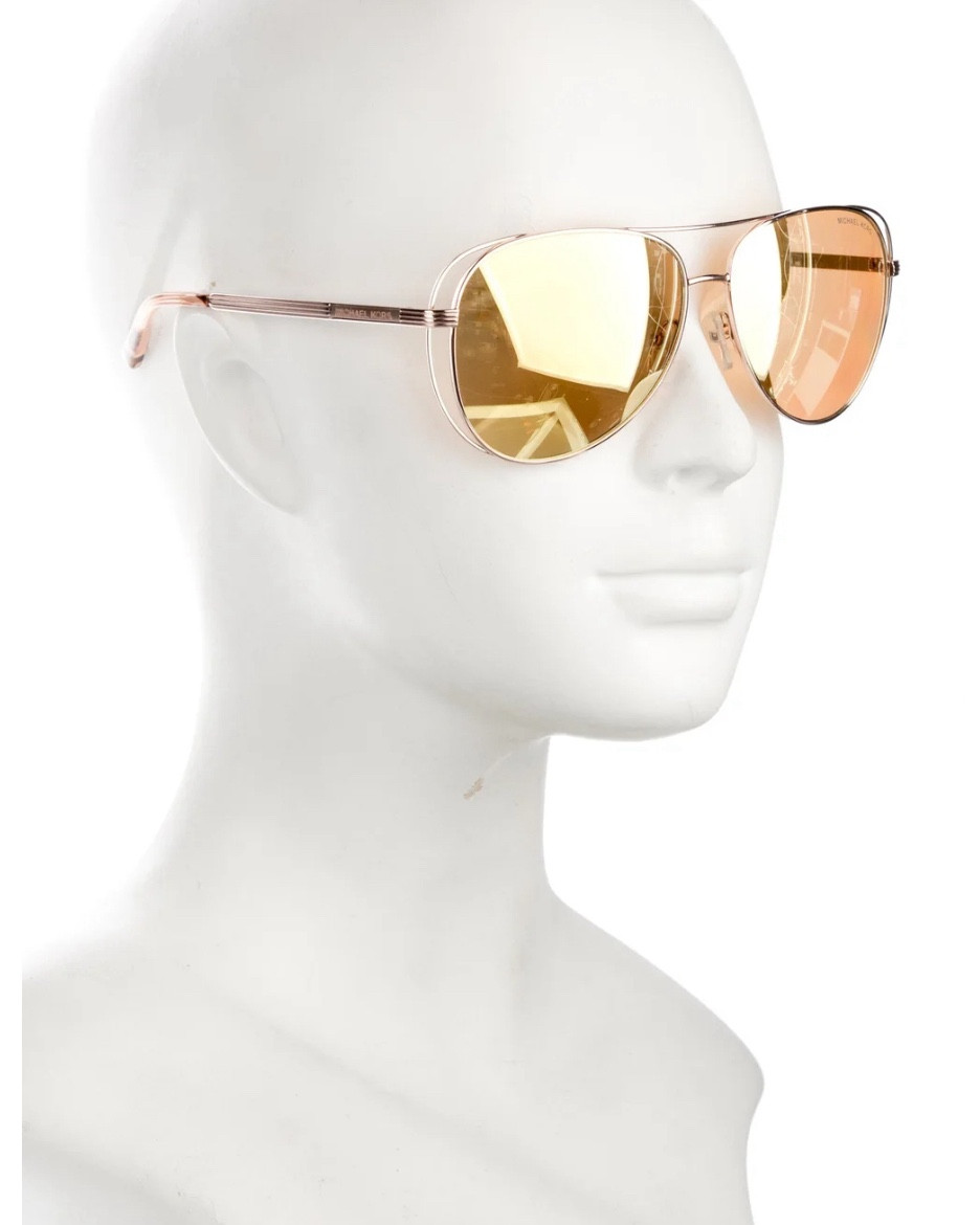 Michael Kors rose gold aviators with cut outs. Great find at only $45! Love the rose gold for summer on tan skin. 

#LTKSummerSales #LTKFindsUnder50 #LTKSwim