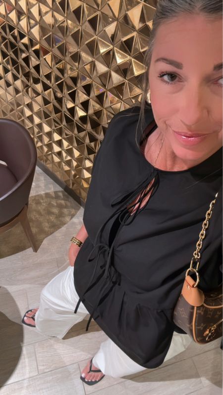 Date night outfit
This style top is super popular and there are some very pricey versions out there but this one is very affordable and great quality. I’m in a medium 
Pants are a small and I love the straight fit without being too wide. 

#LTKStyleTip #LTKOver40 #LTKFindsUnder50