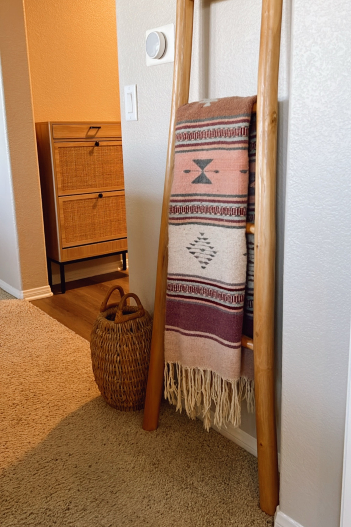 I love mixing passed down pieces with modern finds! This blanket was sourced from South America by Collin’s parents & styled with a teak ladder from Anthropologie and the basket is from my late grandmother 🏜️ 

#southwesterndecor #bohohome #homedecor 

#LTKHome #LTKSaleAlert