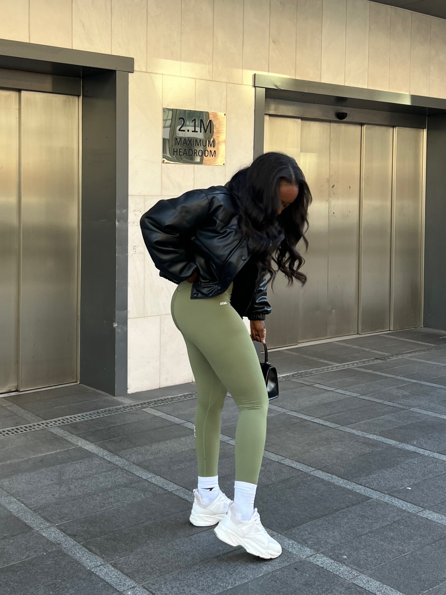 Gym outfit, green leggings, black leather jacket, black puffer jacket, leather look jacket, white trainers, running errands outfit, casual outfit, street style, green styling 

#LTKeurope #LTKSeasonal #LTKstyletip