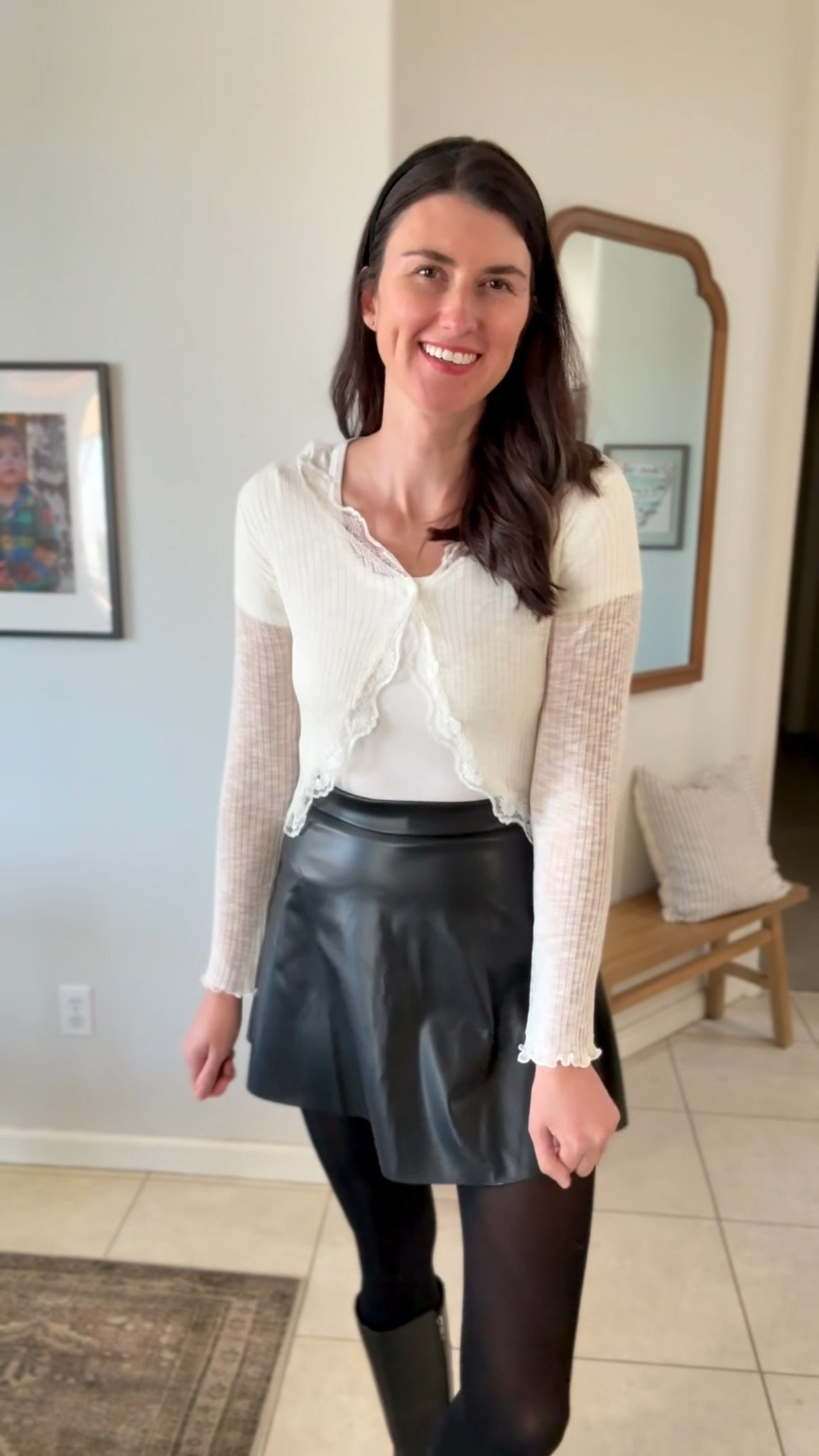 The prettiest lace cardigan. So delicate and feminine. One button on the top. Lettuce trim details on sleeves. I am wearing a size large, I sized up one size. Paired with my new favorite high waist faux leather skirt-also in a large. 

#LTKootd #LTKHoliday #LTKTall