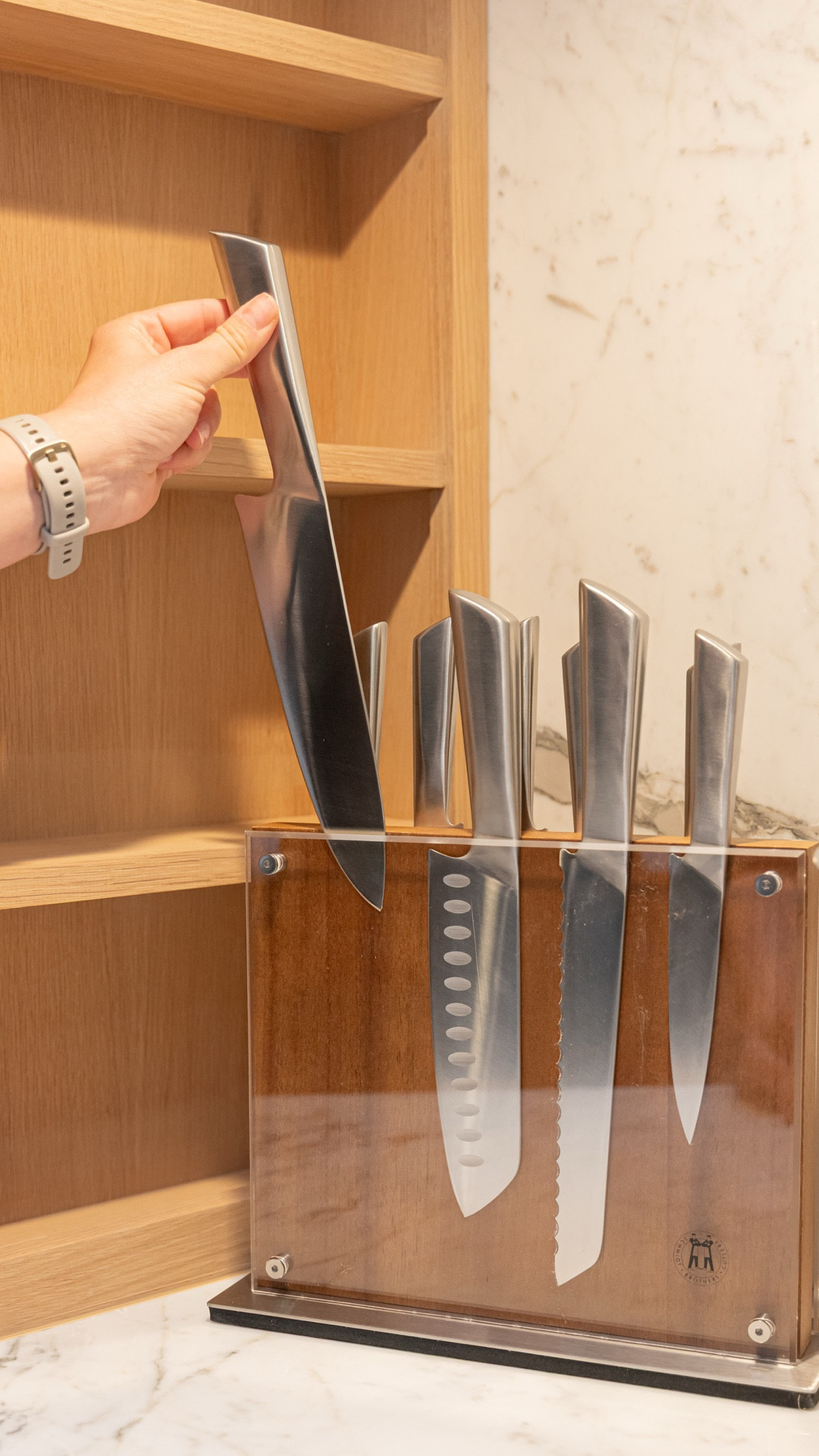 This unique knife block from Schmidt Brothers provides functional decor to this stunning kitchen 💫

#LTKHome #LTKFamily