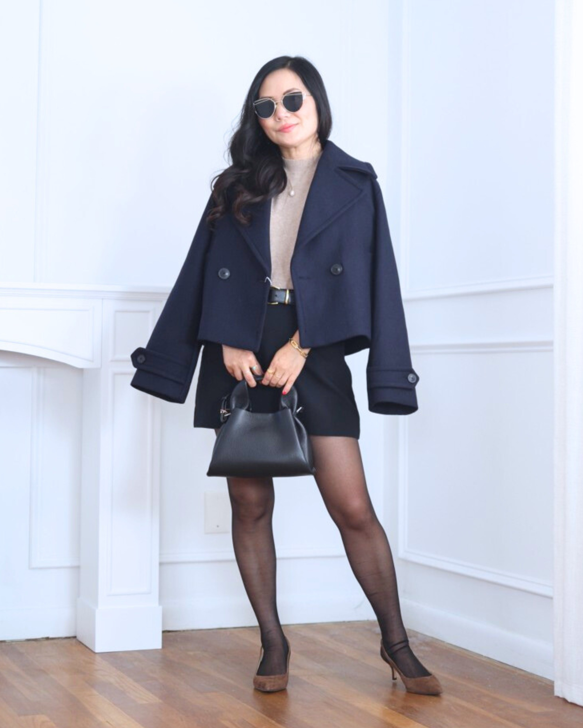 Chic and timeless — this peacoat from Mango paired with a mini skort from Abercrombie and a bag from Quince makes the perfect polished cold-weather look. Effortless, stylish, and ready for anything! I’m 5’2, wearing size XS.

#LTKPetite #LTKootd #LTKOver40