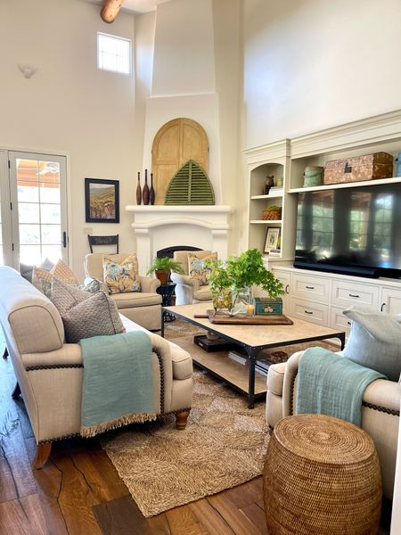 Spring Living Room Decor mixing antique and modernn

#sofa #coffeetable

#LTKStyleTip #LTKHome