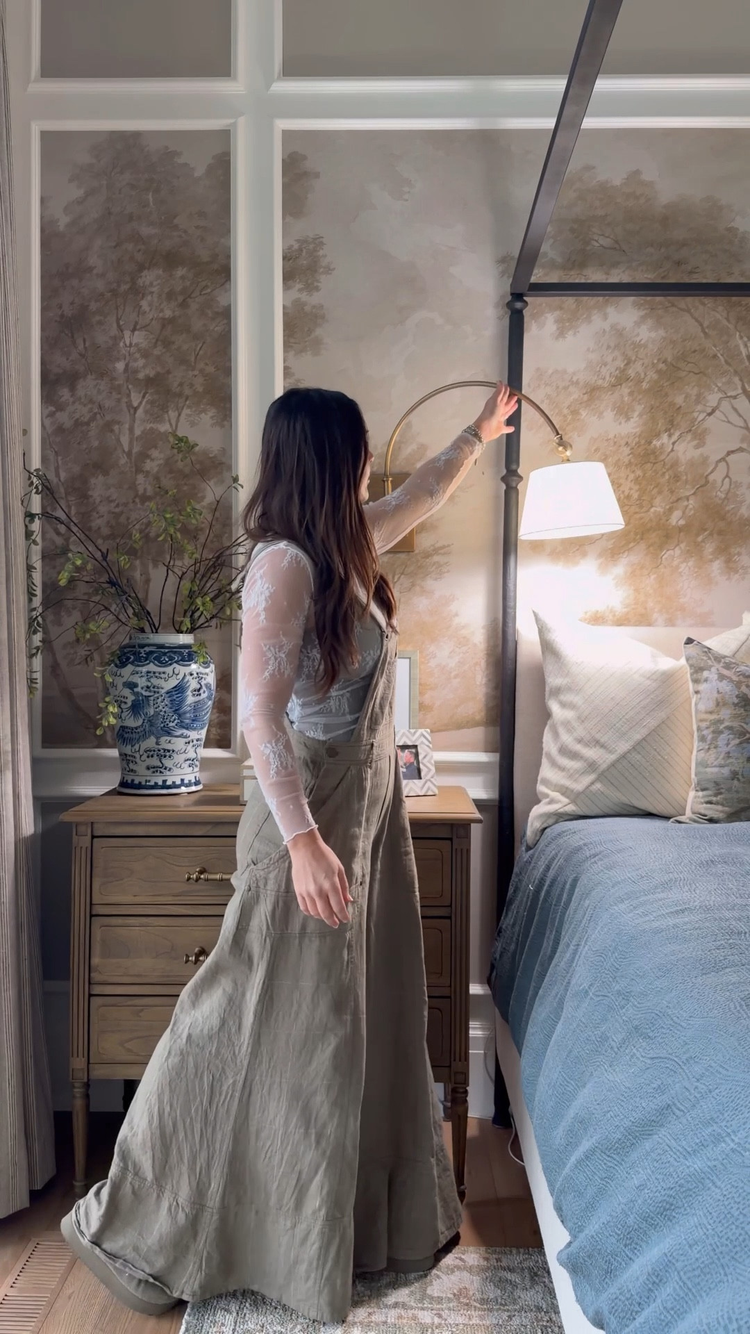 Romantic style bedroom with high arched sconces and look for less option! 
Muted color palette 
Canopy bed and stunning traditional 3 drawer nightstand 
On sale 

#LTKHome #LTKSaleAlert