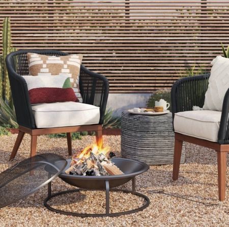 Make your outdoor patio an oasis: the 2 pack Patio Club Chairs in stylish dark gray with a sleek wood-finish light brown. Crafted with a rust- and weather-resistant steel frame, these chairs are built to withstand the elements while maintaining their chic appearance. The open-weave design adds a lively and breezy aesthetic to your patio, while the angled legs infuse a touch of mid-century modern flair. Plus, with DuraSeason fabric seat cushions, comfort and fade resistance are guaranteed, ensuring your relaxation remains uninterrupted. Elevate your outdoor space with these effortlessly stylish club chairs today!

#LTKhome #LTKSeasonal #LTKstyletip