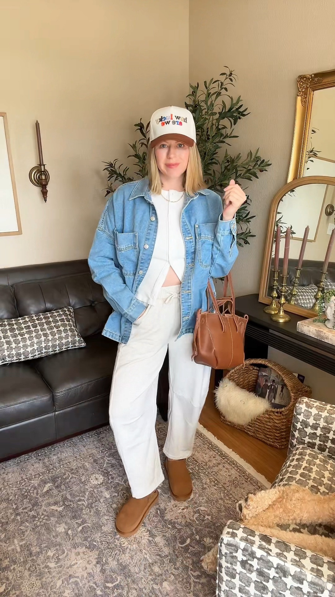 Oversized denim jacket, barrel leg sweatpants, button up tank top, suede clogs, embroidered trucker hat

#LTKFindsUnder50