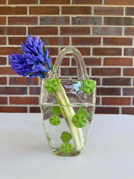 My thrifted purse vase - I’ve linked similar options from Amazon. Flower vase // unique flower vase /: cottage core 

#LTKFindsUnder50 #LTKHome