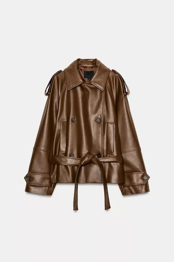 Trench coat with a lapel collar. Long sleeves with tabs on the shoulders and cuffs. Front welt po... | Zara UK