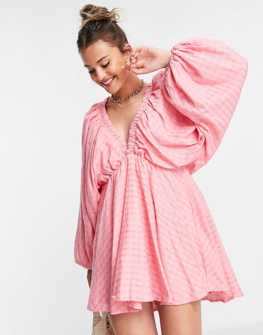 In The Style x Lorna Luxe extreme sleeve plunge mini dress in pink | ASOS (Global)