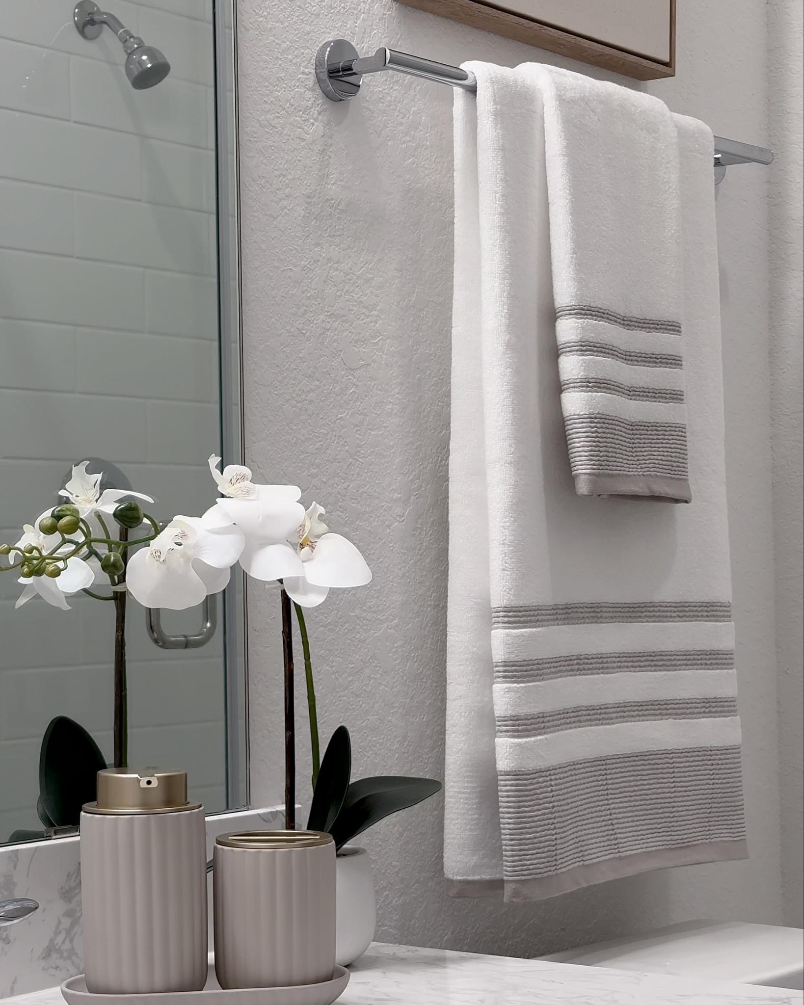 Umm these bath mats!!! 🤌🏽 by far the softest mats I’ve owned. 😍 They also come in black, silver, or white! I love how plush they are and yet functional.  

This lamp is adjustable and provides the perfect ambient lighting for night time - The perfect reading lamp. It also comes in a gorgeous bronze 🤎

I’ve been waiting for these gorgeous soap dispenser and canisters to come back again -  offering various color options and a soft, velvety texture. 🤍🤎🤍

This woven tray is a great addition to your home decor.  It can be used to add a decorative touch to your kitchen counter, coffee table, or bathroom vanity.

Find these below! ☺️ 

#LTKStyleTip #LTKVideo #LTKSaleAlert
