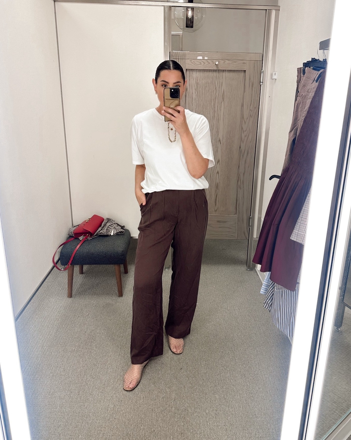 I'm in the large of the oversized tee, it's true to size. 

I'm in the 10 of the pants. TTS, snug fit at waist.  

 