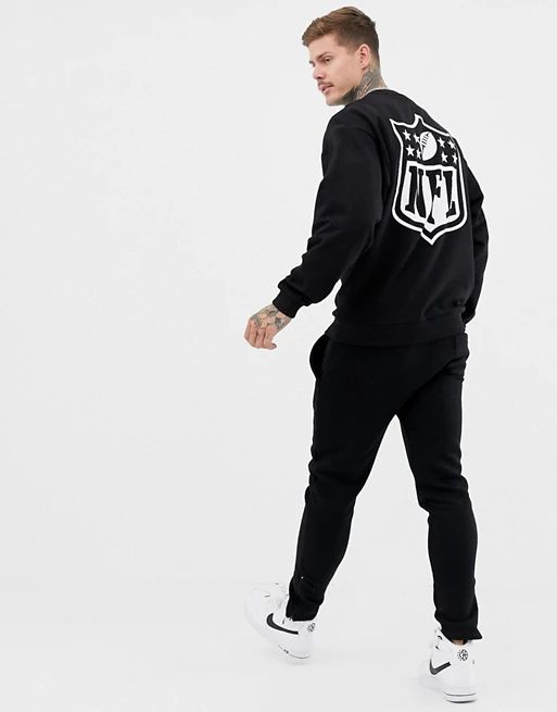 ASOS DESIGN oversized sweatshirt with NFL embroidery and back print in black | ASOS (Global)