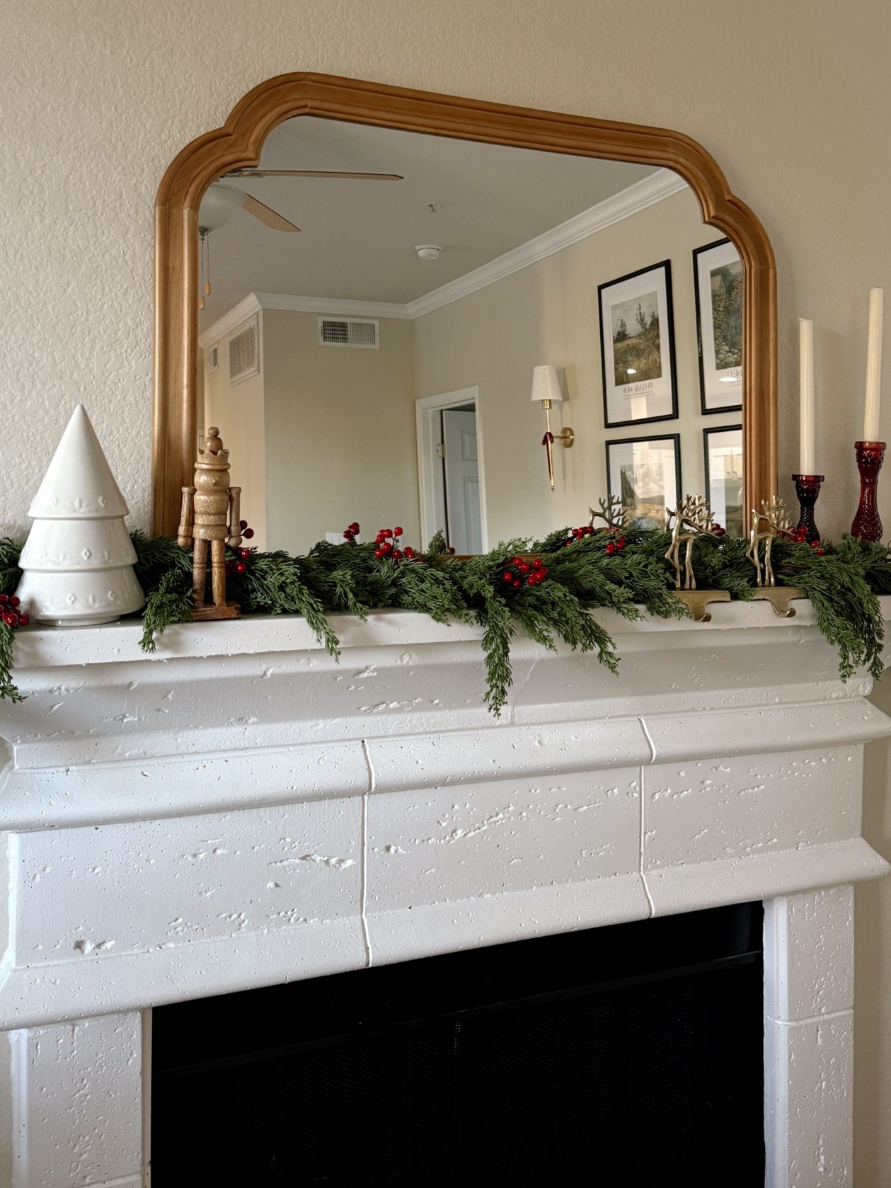 Our first Christmas Mantle 🪞♥️🦌✨
Still waiting on our stockings but I’m in LOVE!!! 

Deer holders are from Home Goods! Linking similar!

#LTKHoliday #LTKHome #LTKSeasonal