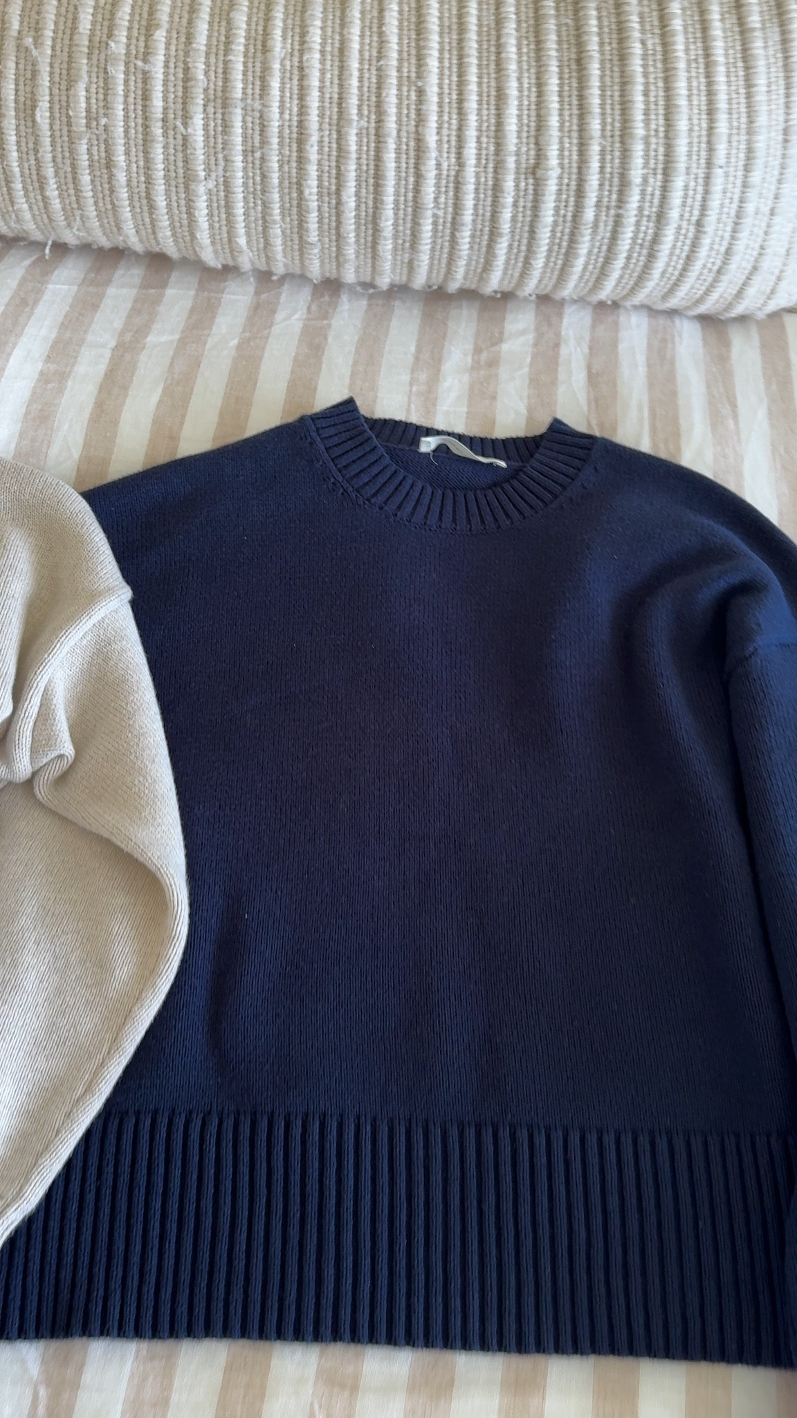 Everlane cotton vs Quince cotton sweater. They're similar but there are some differences. Quince is thicker and has a cinched waist. The material comes in a bit which isn't great for tucking. The material on Everlane is drapey which I love. I love the boxy straight fit too. 

Everlane cotton sweater xs
Quince cotton sweater xs

#LTKstorytime #LTKPetite