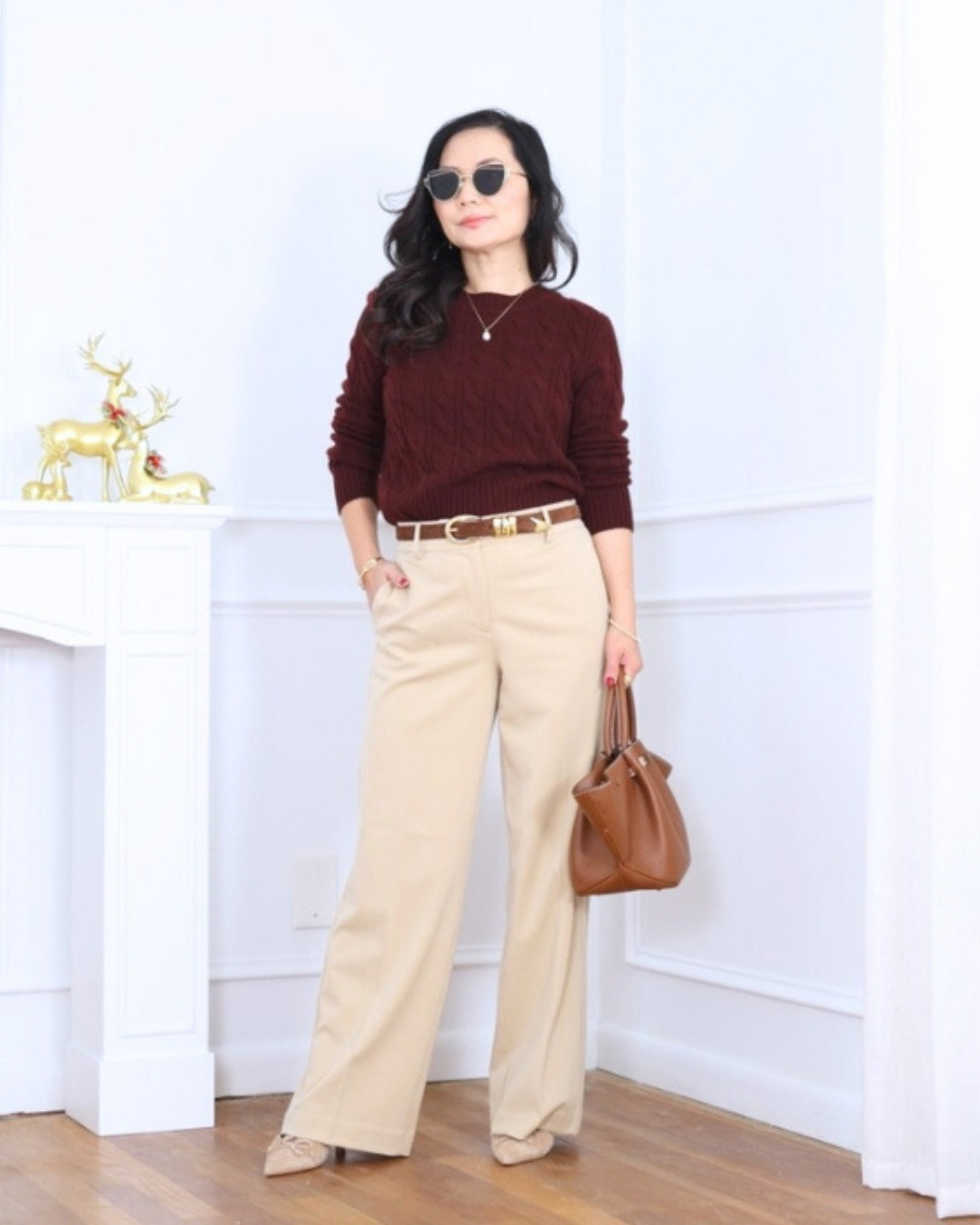 Rich color, clean lines — this burgundy fitted cable sweater from Quince paired with wide-leg pants from Ann Taylor feels polished yet effortless. One of those easy outfits that looks put-together without any extra thought. I’m 5’2, wearing size XS for sweater and size 2 for pants. 

#LTKPetite #LTKootd #LTKOver40
