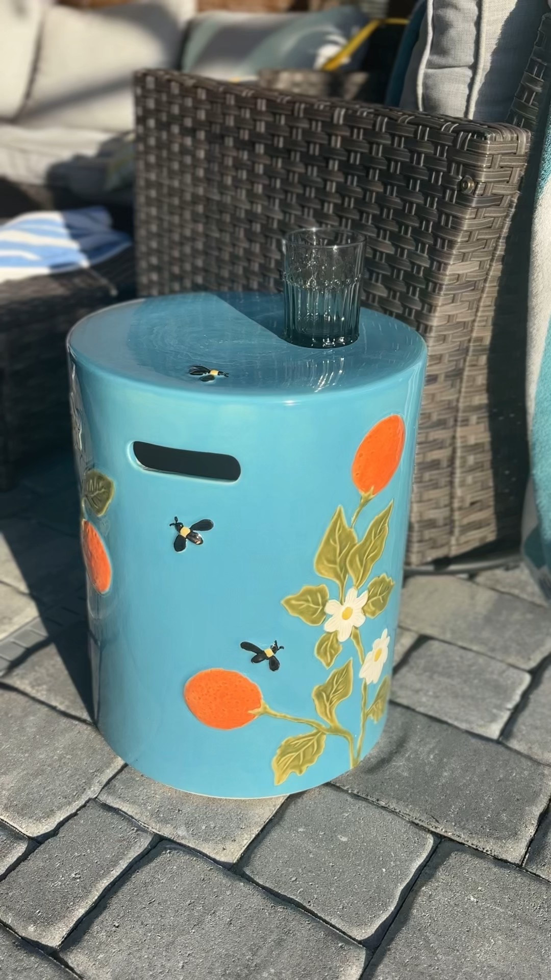 How cute is this outdoor side table—with sweet orange blossoms and tiny bumblebees, it’s like a little garden party on your patio! 🍊🐝

#LTKHome