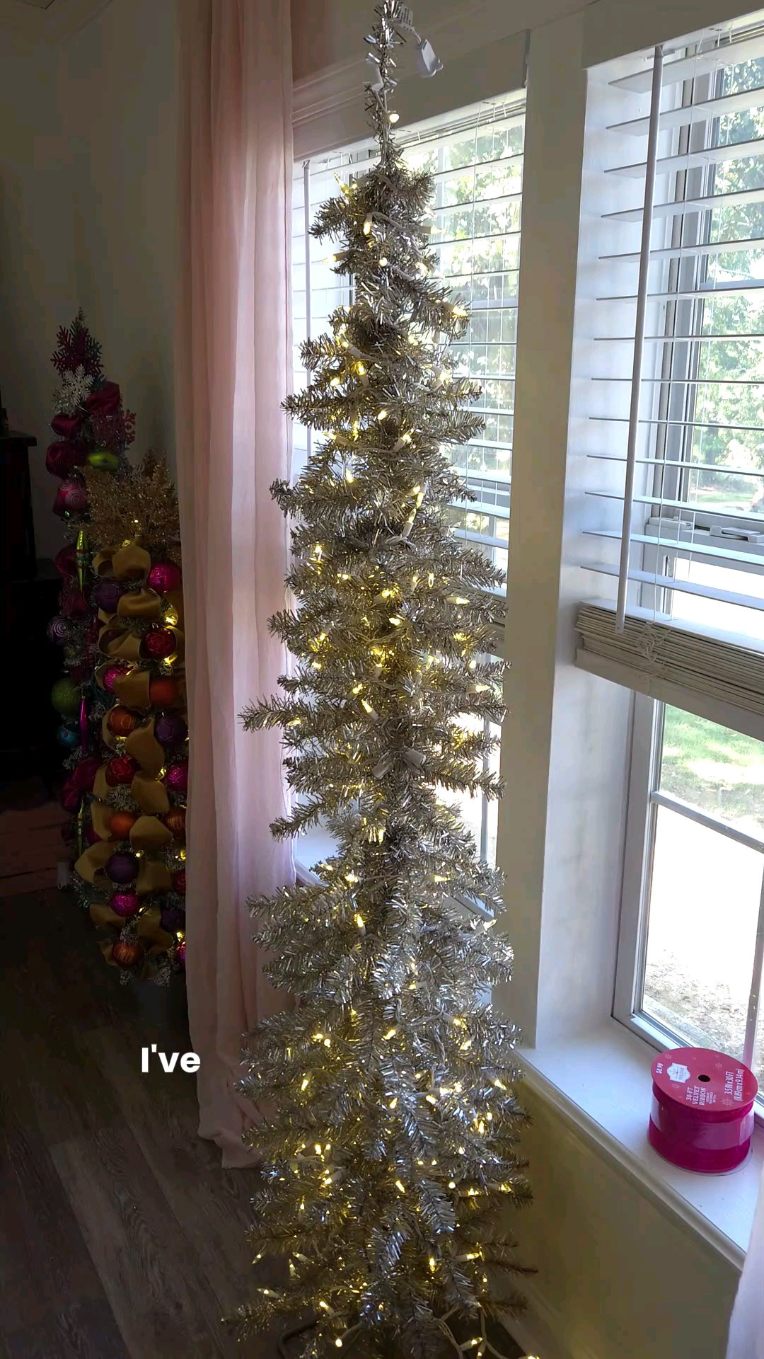 Decorating my tinsel Christmas tree that I've had for 7 years! So happy with how it turned out. I went a little crazy with the ribbon, but it really added a lot to the tree. And can you believe all of this ribbon is from Walmart!? 🎄🎀

#LTKHoliday #LTKSeasonal #LTKHome