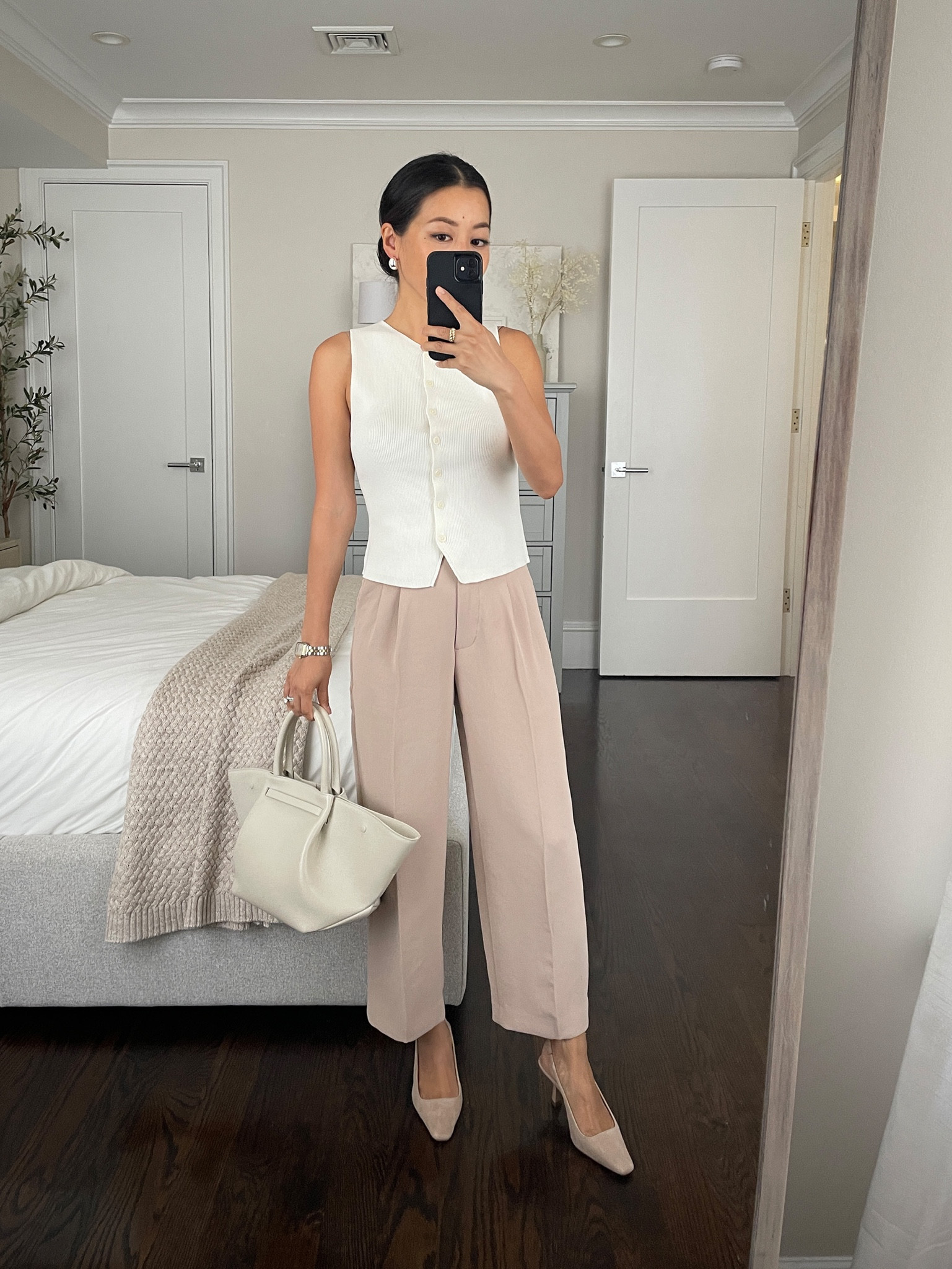 Polished workwear outfit 

• Aritzia effortless pants in cropped regular size 0. Has a 23.5” inseam with an 11” high rise. 

Size 00 fits a 24” waist and is snug on me, 0 fits a 25.5” waist and is a little more comfy for me. 

• Aritzia Wilfred lightweight sweater vest xs - I sized up in this to avoid button gaping since I tend to have issues with that, but it’s now a looser fit on me. 

I also love the Madewell top linked - such a good elevated work to weekend basic 

• Demellier bag 

•Ann Taylor slingbacks (old; similar linked). I tried the ones from nordstorm linked and thought it was pretty similar and TTs

#LTKstyletip #LTKSeasonal #LTKworkwear