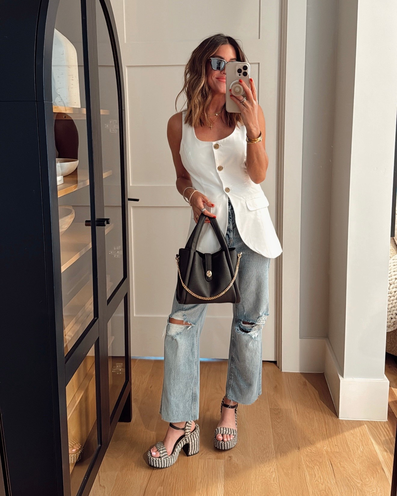 My top, jeans, and bag are all under $30! 🙌🏼 everything is true to size. I chopped the bottom off of these jeans to make them a bit shorter to wear with heels and sandals! 

#LTKStyleTip #LTKSaleAlert #LTKFindsUnder50