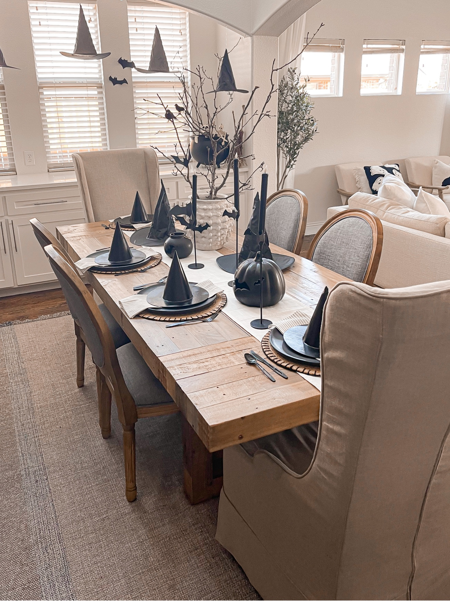 Halloween tablescape number 2 of the season. ✌️🧙🏻‍♀️ This time, I've switched things up with a chic neutral color scheme, stepping away from the pinks that have been my go-to. Loving how the earthy tones and subtle spooky touches have transformed the space. The witches hats on the place setting came from Joann and I couldn’t link but the bigger ones came from Amazon 

Halloween tablescape - Fall tablescape - Neutral Halloween tablescape- Tablesetting 

#LTKSeasonal #LTKunder50 #LTKhome