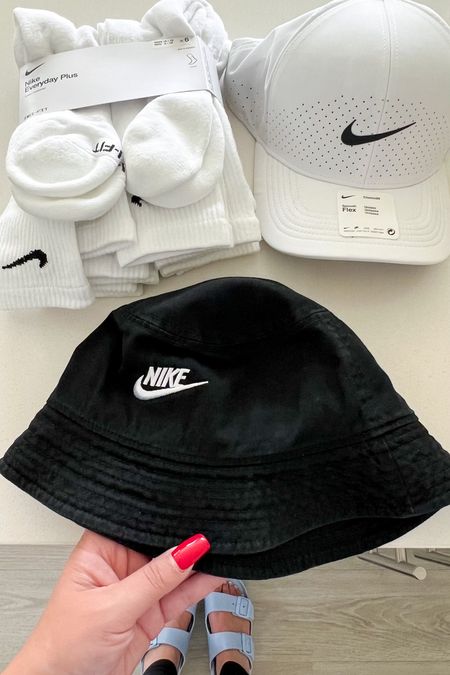 The best Nike essentials!!! This black bucket hat will go with everything! And it’s great for summer! And this white baseball hat is so cute and is unisex!! And it’s always great to have a long pair of socks to scrunch down with your sneakers!!! #hat #buckethat #baseballhat #athleisure 

#LTKfit #LTKstyletip #LTKunder50