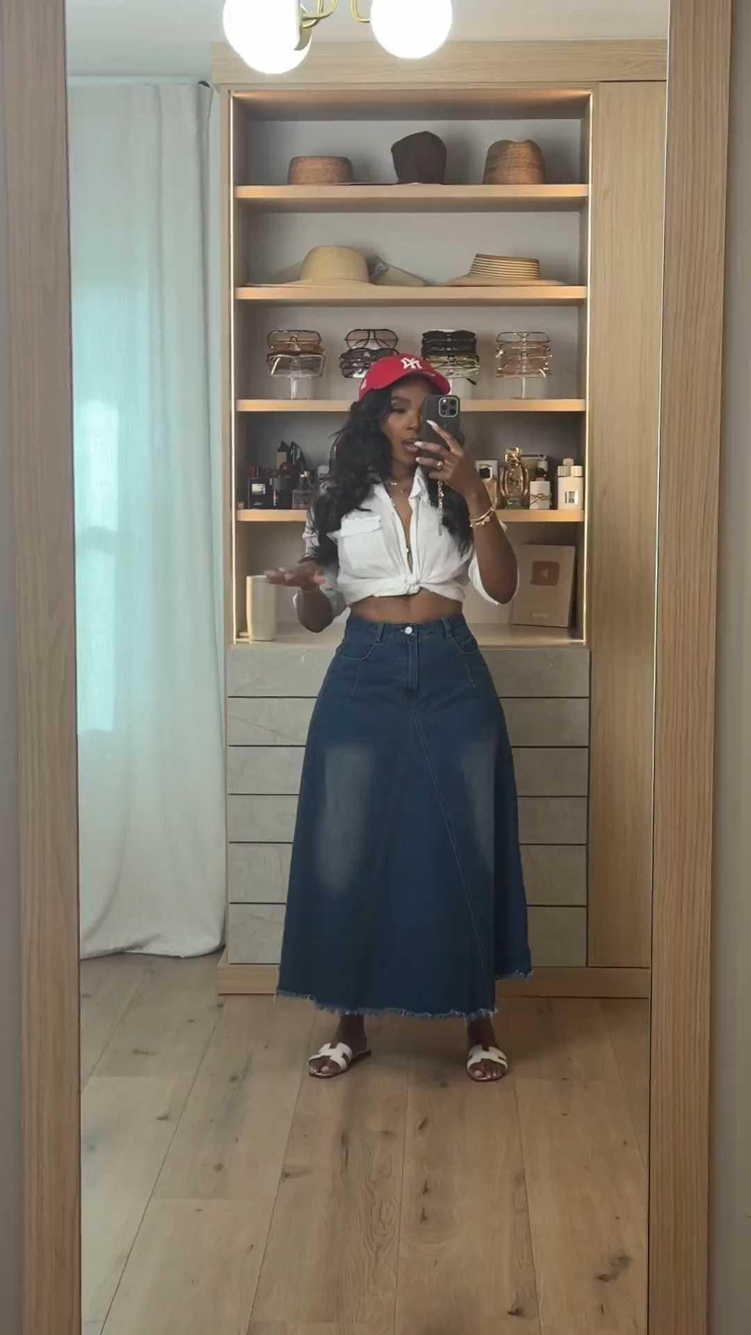 The sporty-chic outfit formula I keep coming back to lately ❤️🧢

A denim maxi skirt instantly makes casual basics feel styled and elevated, especially paired with a crisp tied button down and a pop of red. Love how this look gives effortless off-duty energy while still looking polished enough to wear out all day. These are the kind of wardrobe staples you can remix so many ways, making the cost per wear so worth it.

Perfect for weekend errands, brunch dates, casual dinners, shopping days, travel outfits, baseball games, and everyday summer styling.

5’4 | 140LBS | 34D-27-40 | size small or 4

Denim maxi skirt outfit, sporty chic style, casual summer outfit women, red baseball cap outfit, effortless everyday style, elevated casual fashion, white button down outfit, trendy denim skirt looks, off duty model style, comfortable chic outfits, summer street style women, casual cool girl aesthetic

Follow me on Instagram and YouTube @kirasfashionfinds

#LTKgrwm #LTKootd #LTKvlog