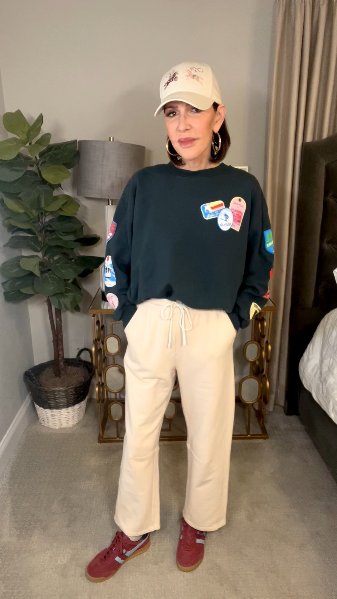 barrel leg sweatpants, graphic pullover, red sneakers, casual outfit, over 50 outfits 

#LTKSeasonal #LTKOver40 #LTKootd