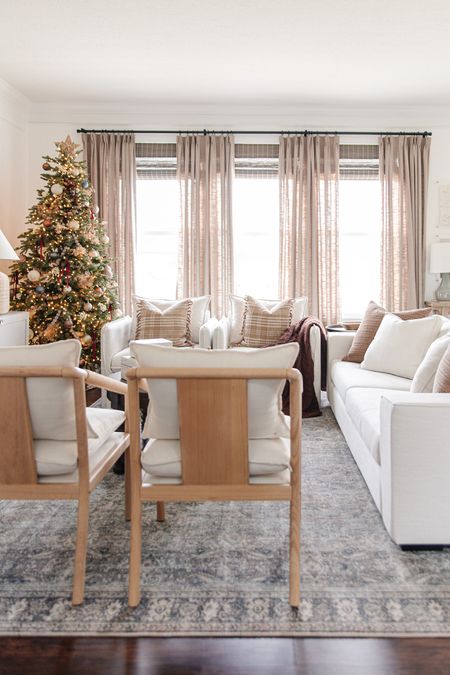 Cozy living room decor, ventura chair, berea chair, wood frame accent chair, linen slipcover accent chair, realistic artificial christmas tree with led lights, white sofa, target throw pillows

#LTKHoliday #LTKSeasonal #LTKhome