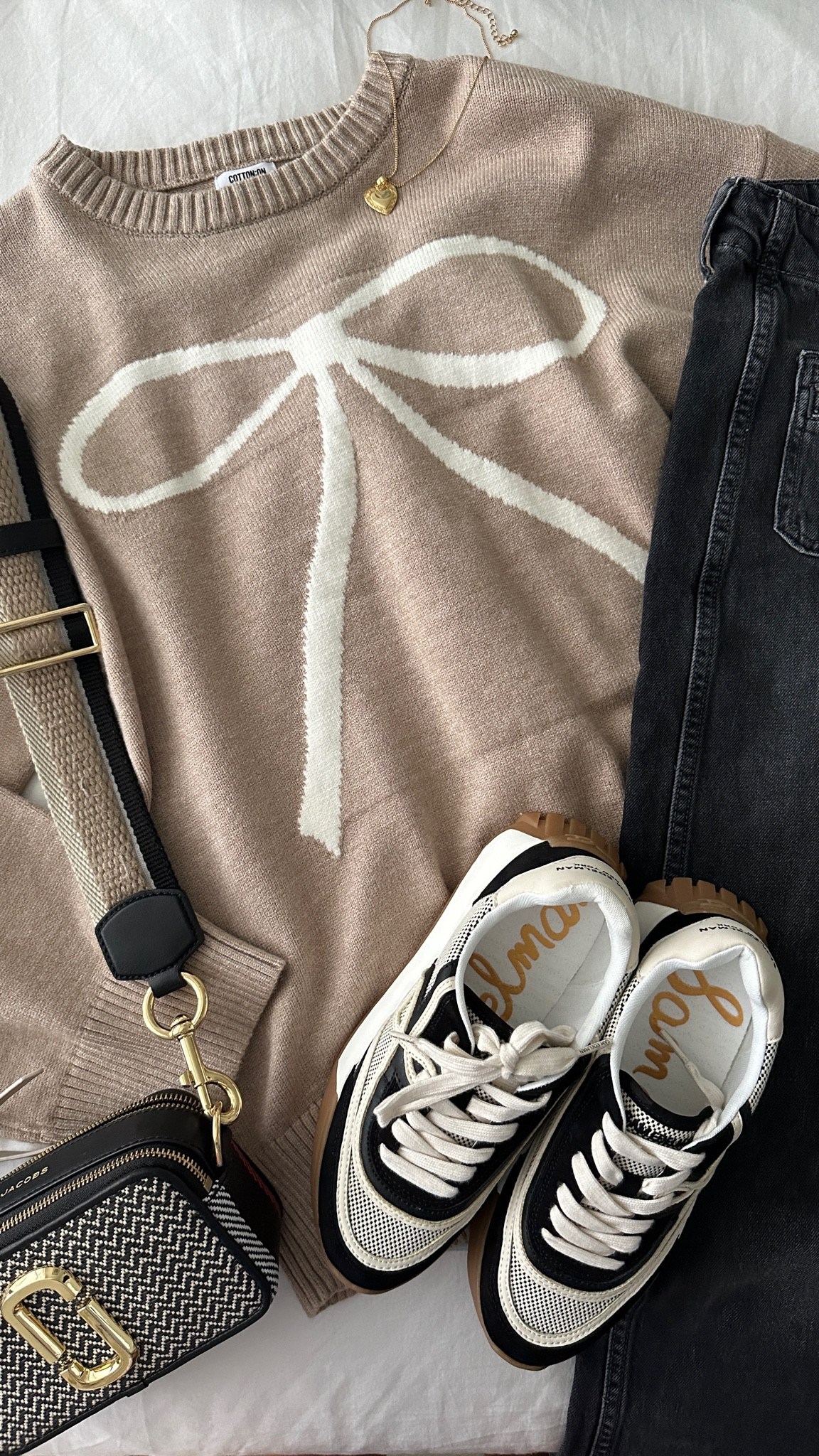 first day this season that the weather has gotten below 50 degrees! I’ve been waiting to wear this adorable bow sweater so had to take advantage 🤍

#LTKSeasonal #LTKWorkwear #LTKShoeCrush