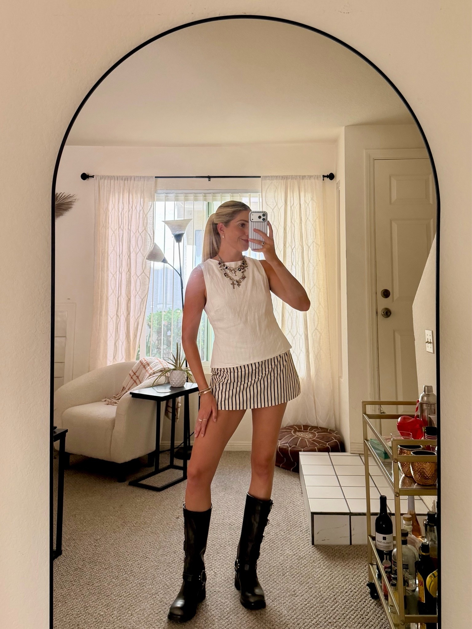 summer outfit inspo, concert outfit, festival outfit inspo / striped skirt, white linen top, combat boots