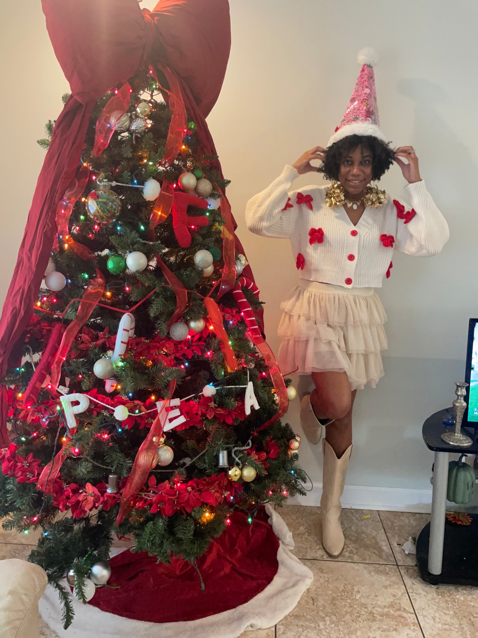 Tulle skirt +
Bow cardigan +
Pink Santa hat

#LTKootd #LTKFindsUnder50 #LTKHoliday