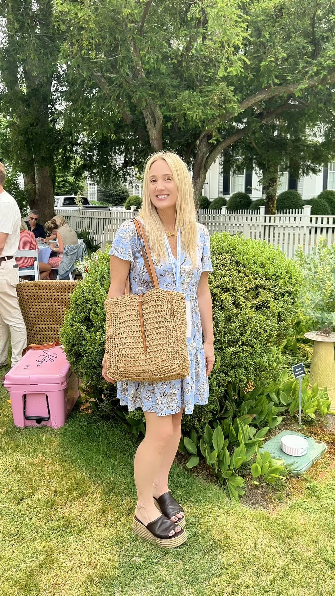 I bought this Oxford blue dress with brown print at a pop up on Nantucket in June and then wore it again this month for a conference. Wearing it with a bag and leather wedges from Lonza. Link below.