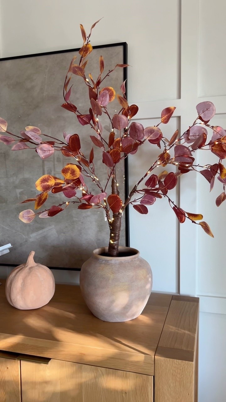 This pre lit tree gives a perfect cozy glow 🍂

#LTKHome #LTKSeasonal