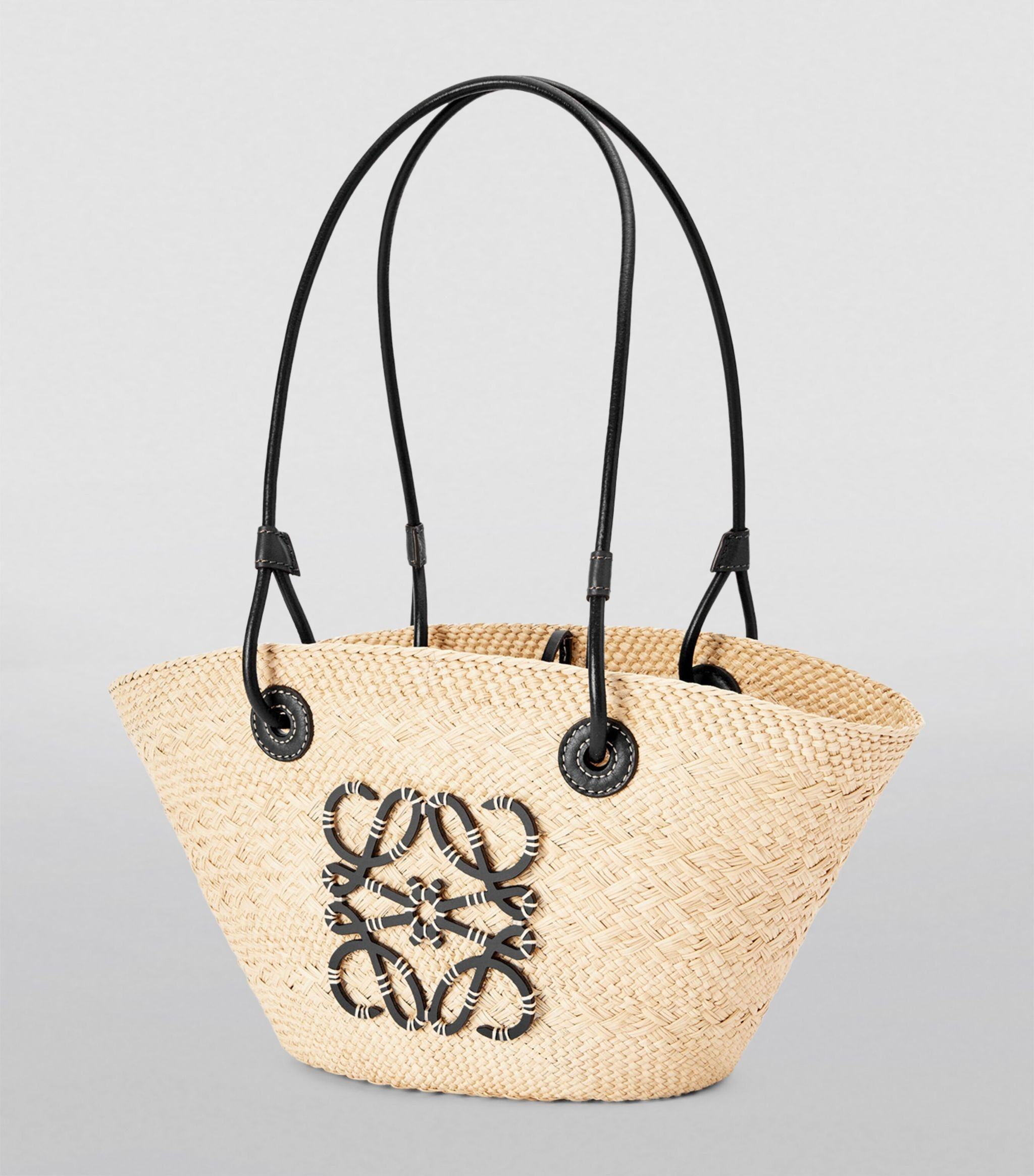 x Paula’s Ibiza Small Woven Anagram Basket Bag | Harrods