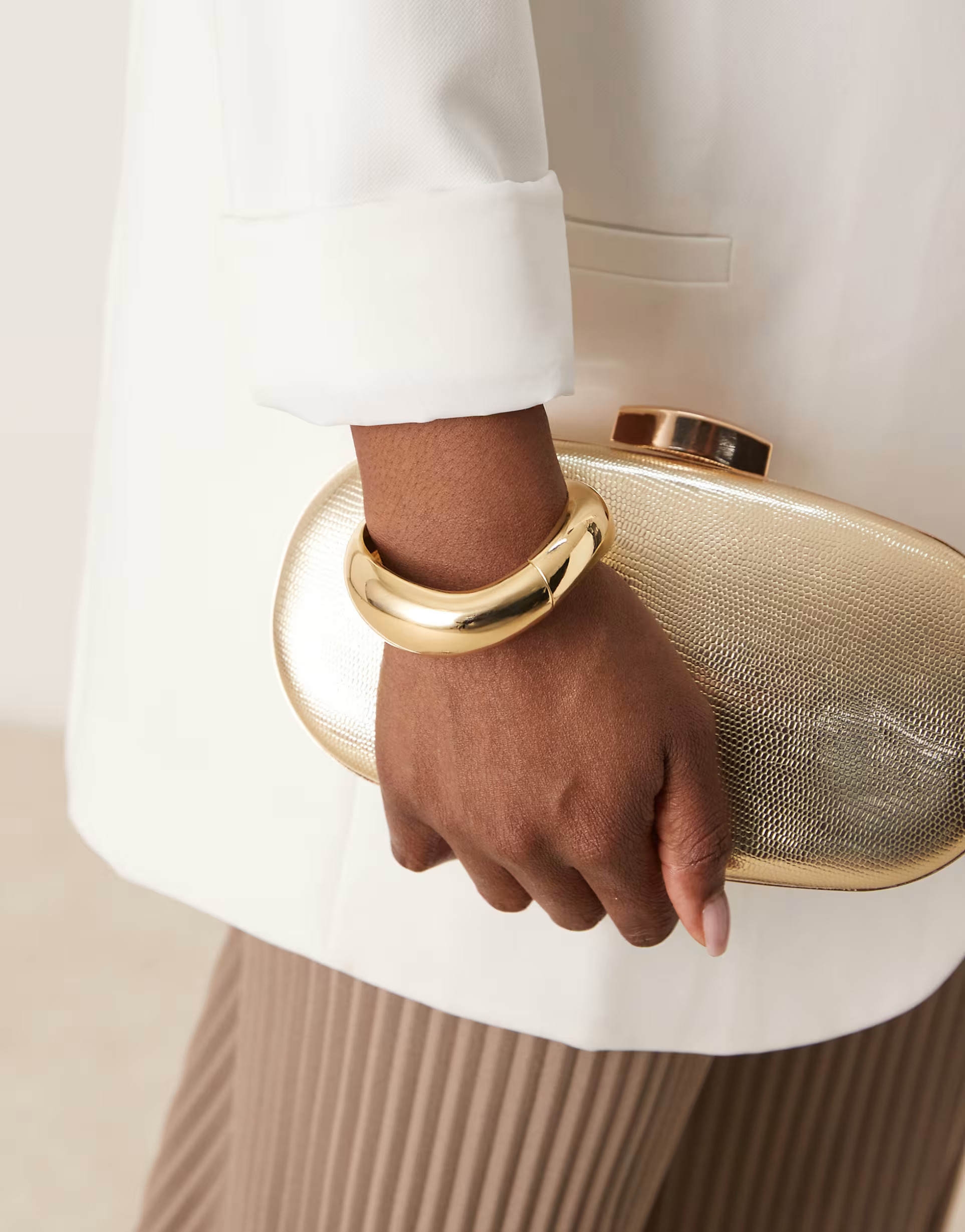 ASOS DESIGN cuff bracelet with twist design in gold | ASOS | ASOS (Global)