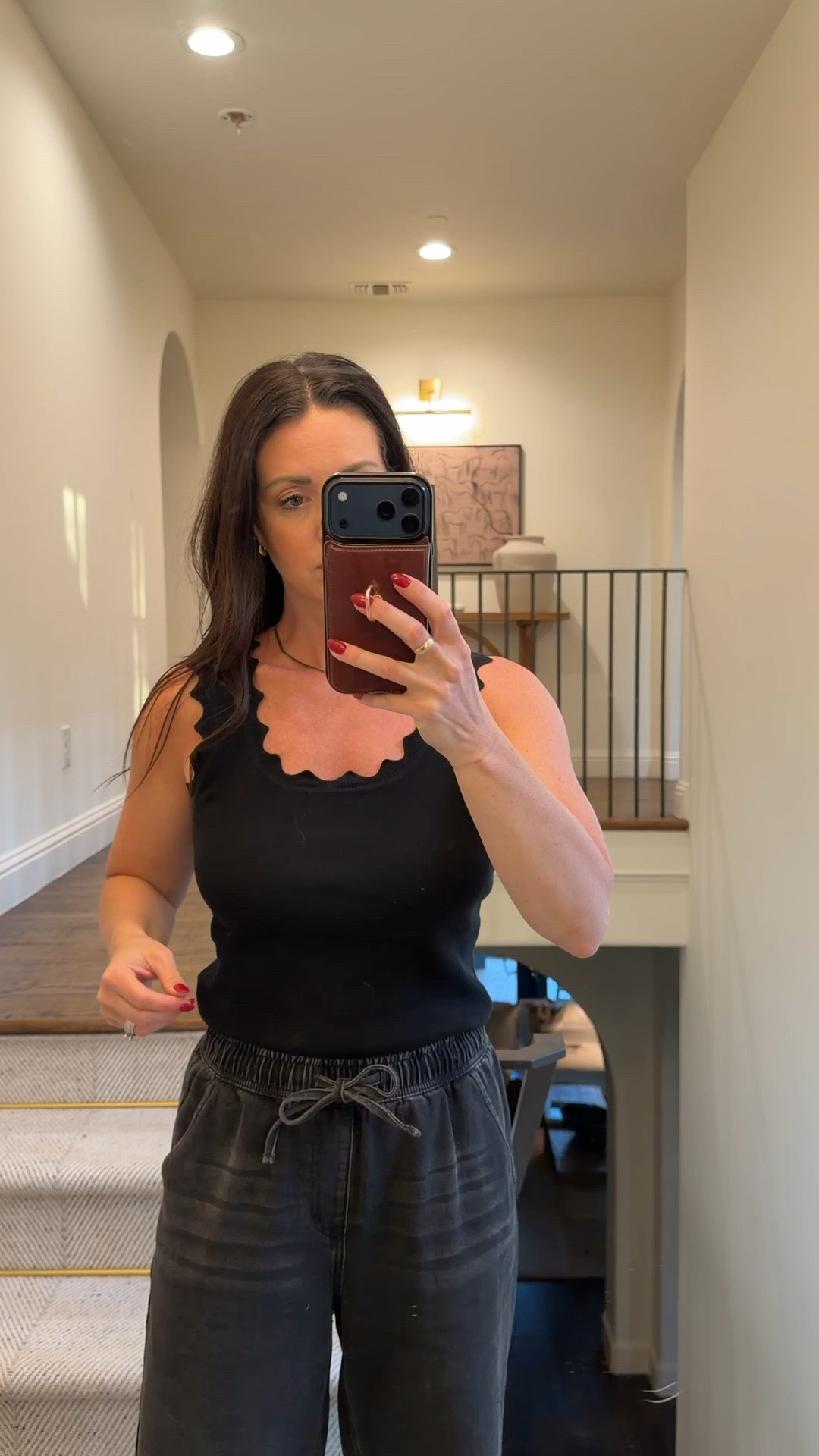 Perfect staple black tank for this season! Love the scallop neck line, it adds a thing to a basic piece. Wearing a small. 

#LTKootd #LTKSeasonal #LTKOver40