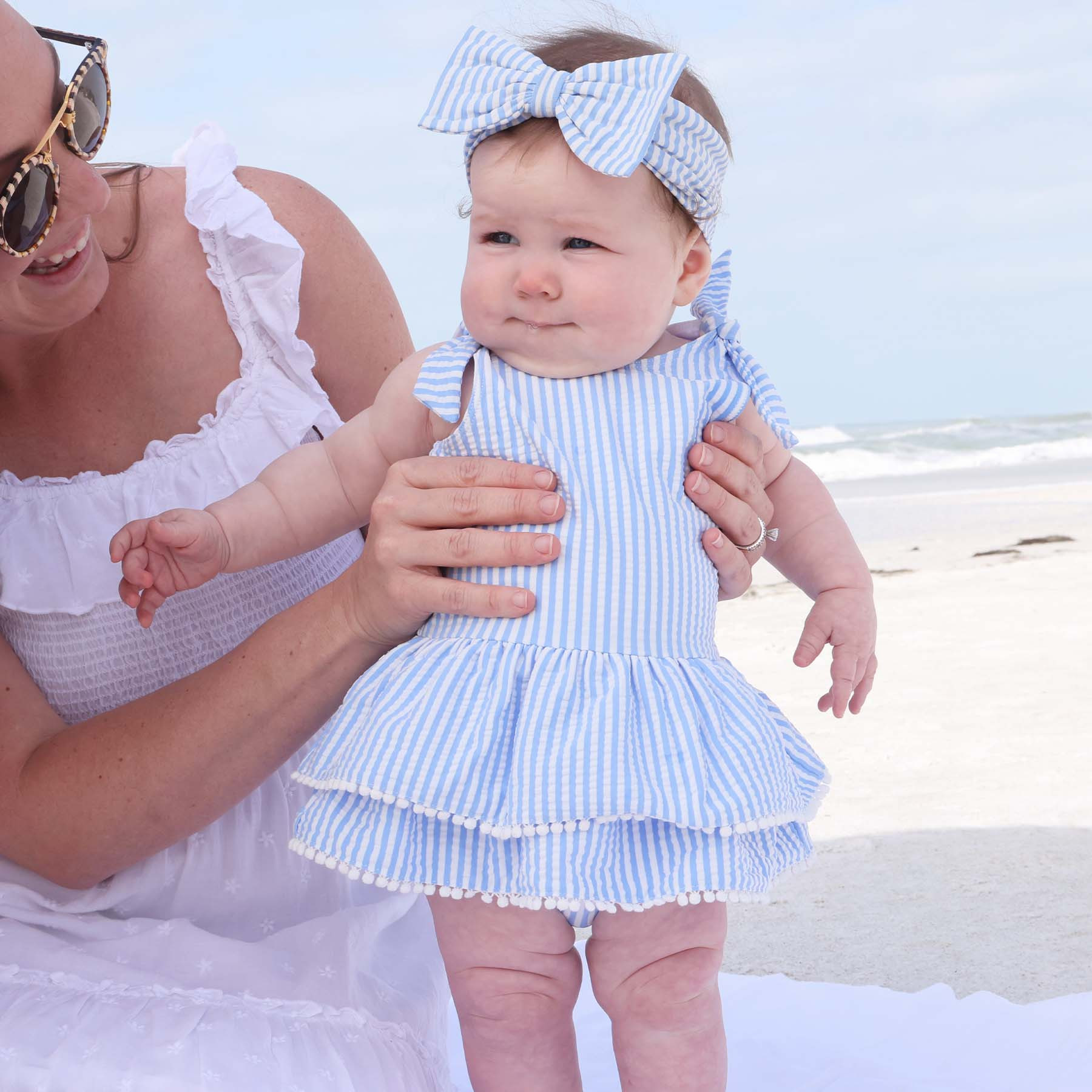 Tiered Skirt with White Pom Trim | Seersucker Blue | Caden Lane