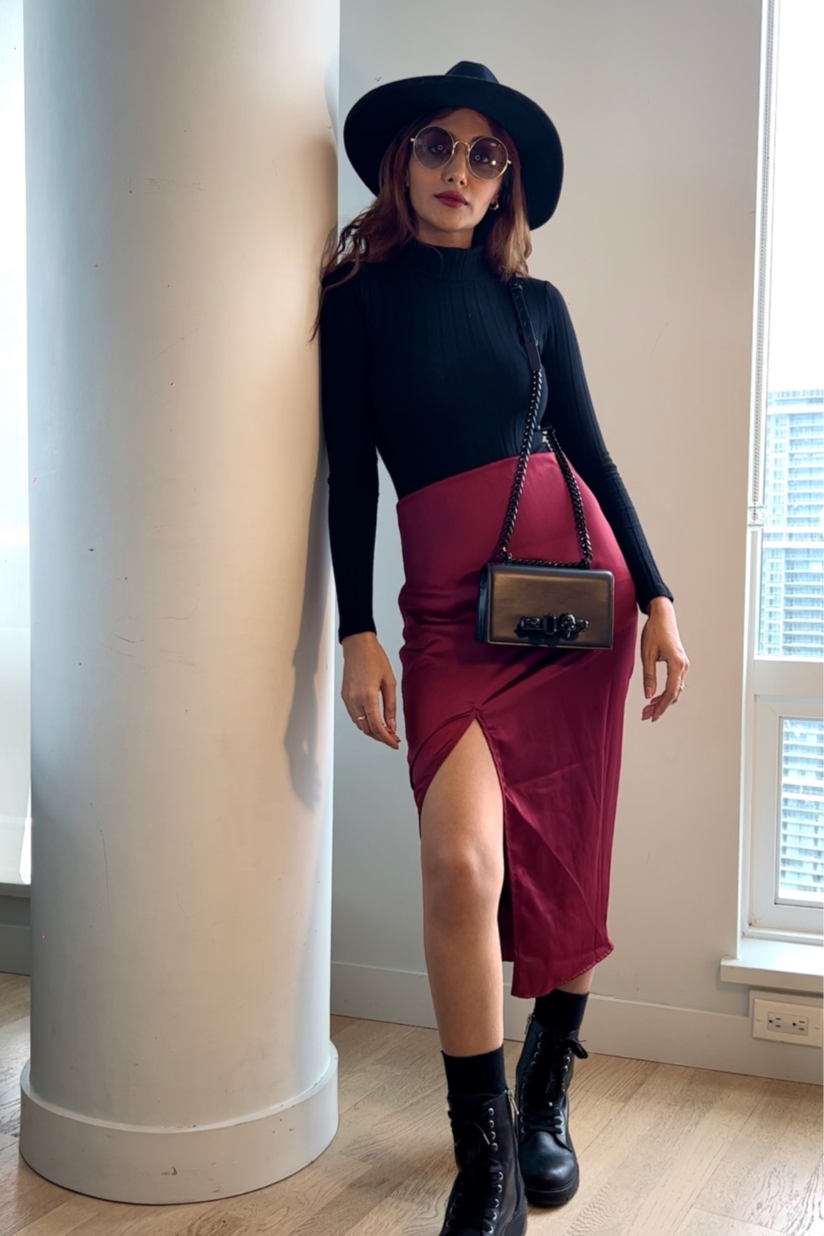 Burgundy satin dress as a skirt, paired with a black turtleneck bodysuit and combat boots 

#LTKU #LTKFind #LTKGiftGuide