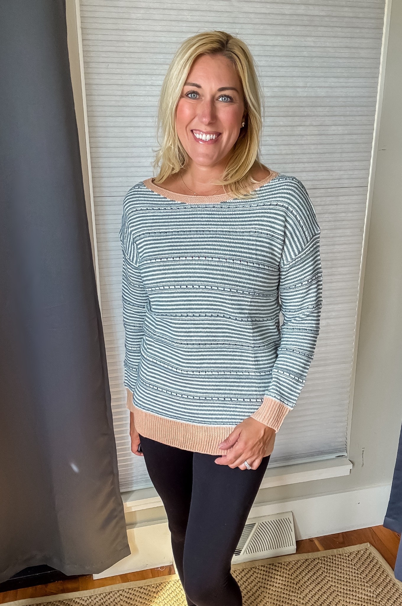 Love this lightweight boatneck sweater with the prettiest contrast trim. So easy to dress up with jeans or keep casual with leggings and just right for that in-between weather!