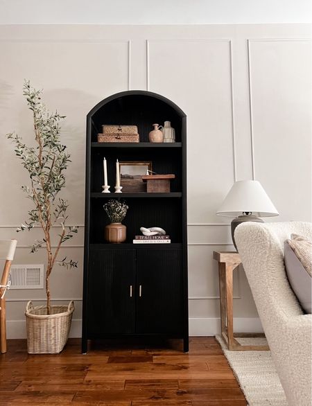 The version of my black arched bookshelf without the cabinet is back in stock in both colors! Act fast if you want one - I’m sure they’ll elk out again quickly! Living room decor 

#LTKhome #LTKFind